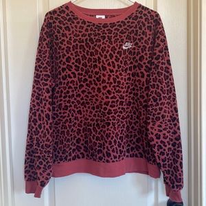 Nike Women’s Medium Pink Leopard Print Sweatshirt.